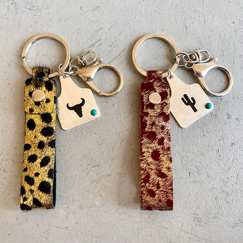 Genuine Leather Alloy Keychain - Premium Key chain from Trendsi - Just $12! Shop now at Handbags Specialist Headquarter