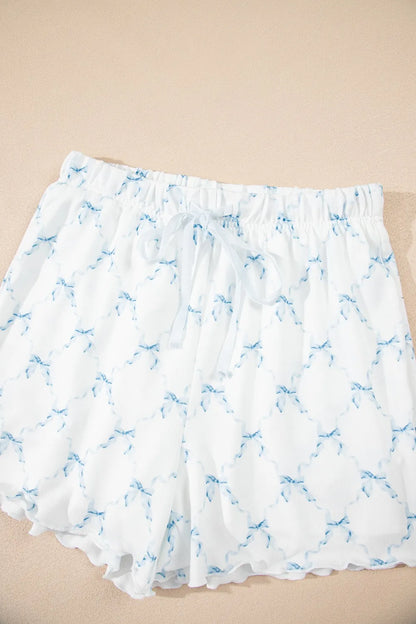 Printed Round Neck Top and Shorts Two-Piece Lounge Set - Premium Sleepwear from Trendsi - Just $39.99! Shop now at Handbags Specialist Headquarter