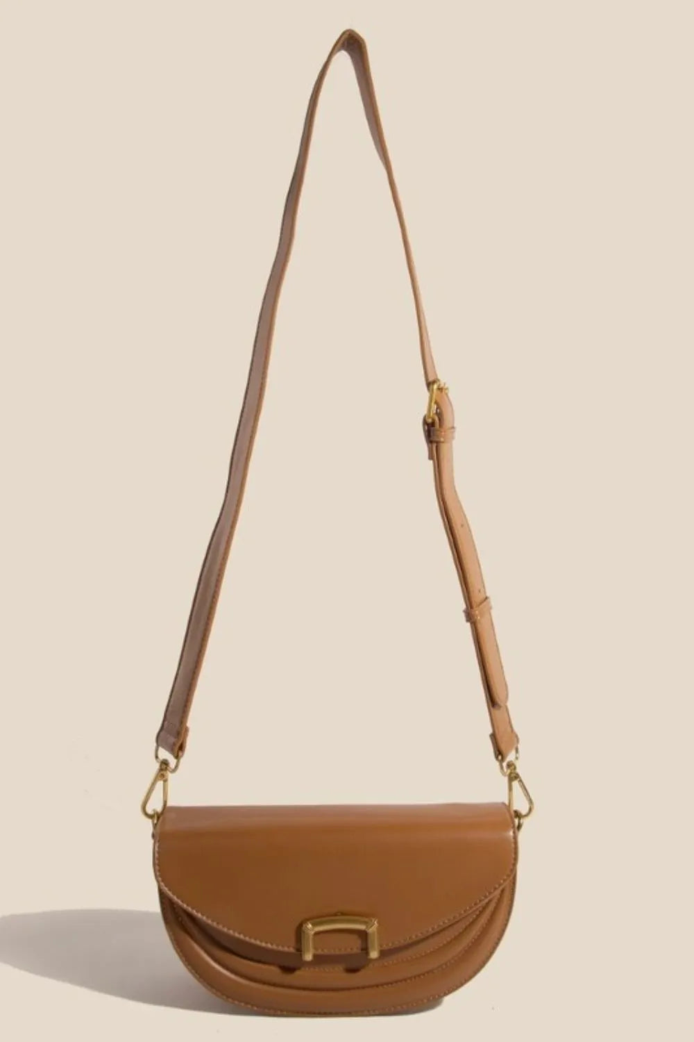 Fame Buckle Closure Crescent Faux Leather Crossbody Bag - Premium Crossbody Bag from Trendsi - Just $53.99! Shop now at Handbags Specialist Headquarter