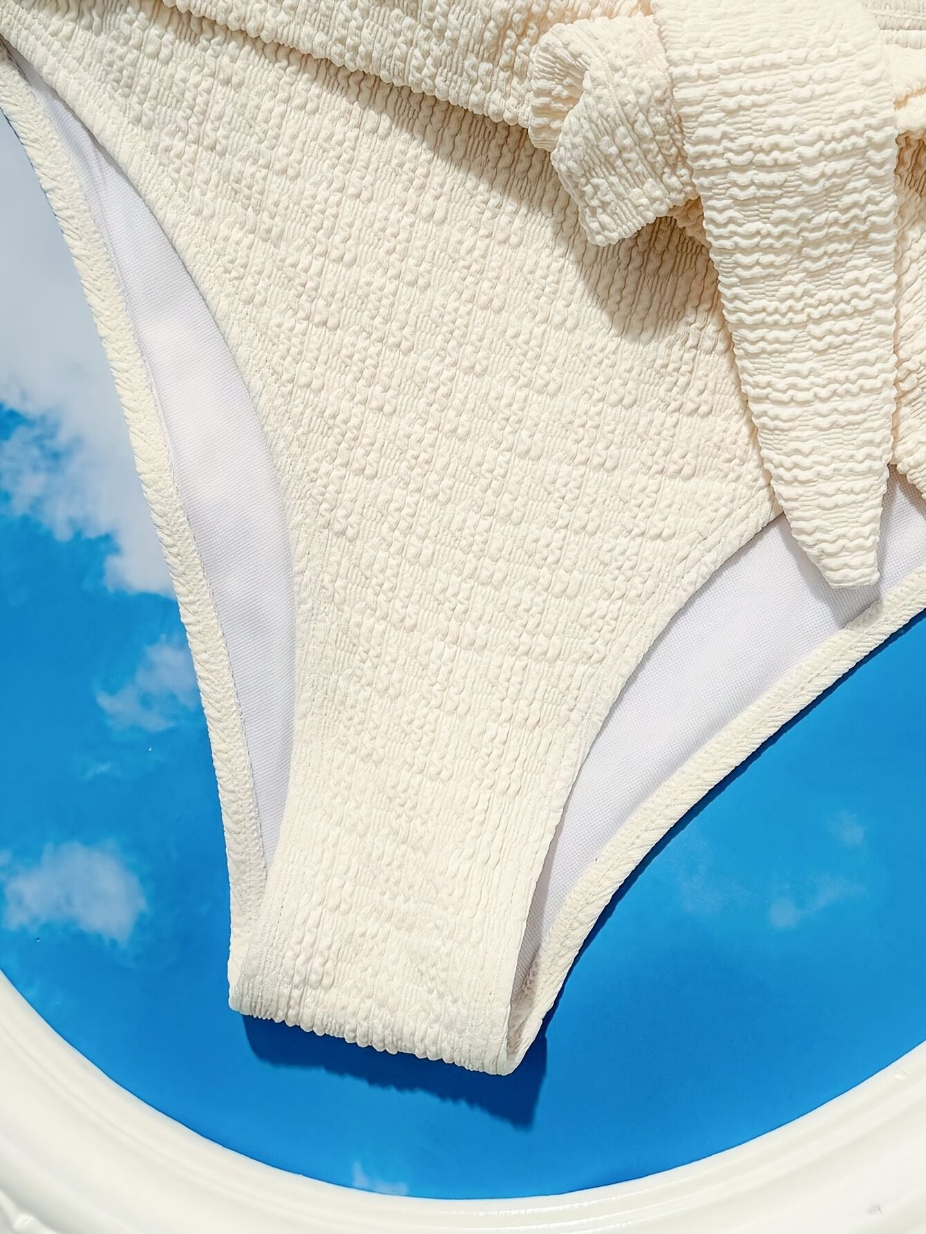 Ladies' white split beach bikini swimwear with shell embellishment, elegant and sexy - Premium Swimsuit Set from Doba - Just $29.28! Shop now at Handbags Specialist Headquarter