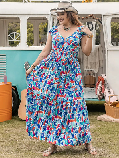 Plus Size Printed Cap Sleeve Dress - Premium Dresses from Trendsi - Just $42.99! Shop now at Handbags Specialist Headquarter