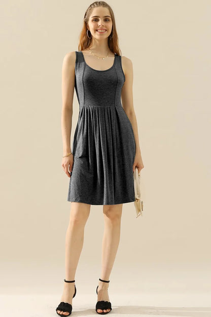 Doublju Full Size Round Neck Ruched Sleeveless Dress with Pockets - Premium Dresses from Trendsi - Just $15.99! Shop now at Handbags Specialist Headquarter