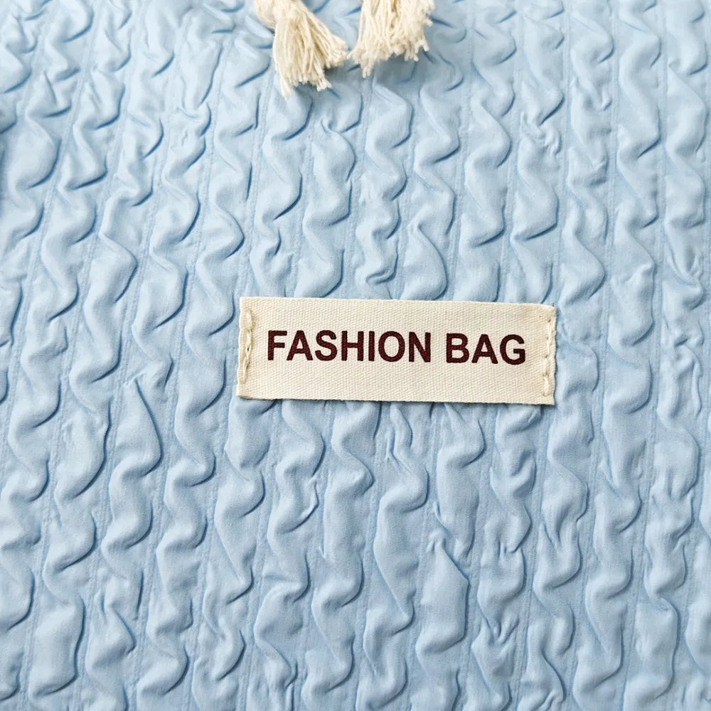 Textured Nylon Travel Bag - Premium travel-bag from Trendsi - Just $44.99! Shop now at Handbags Specialist Headquarter