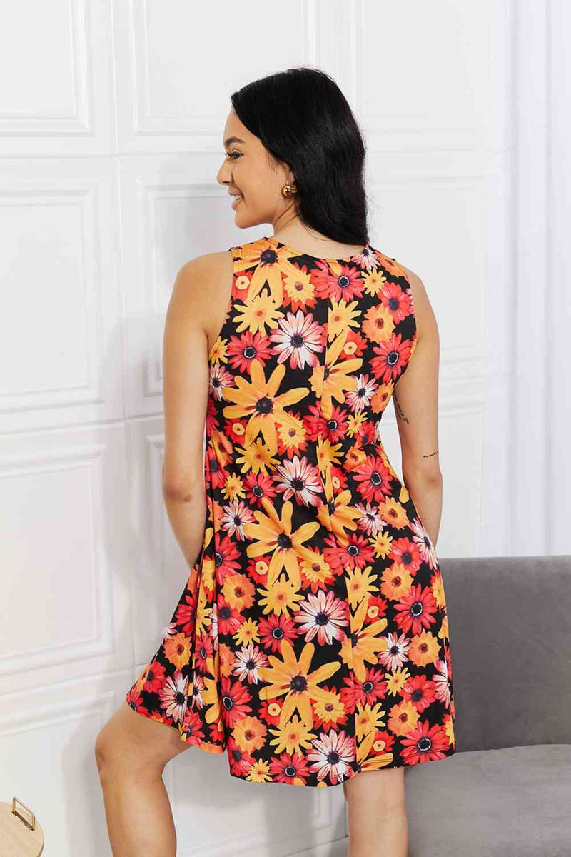 Yelete Full Size Floral Sleeveless Dress with Pockets - Premium Dresses from Trendsi - Just $31! Shop now at Handbags Specialist Headquarter
